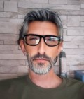 Chris 55 ans Paris France